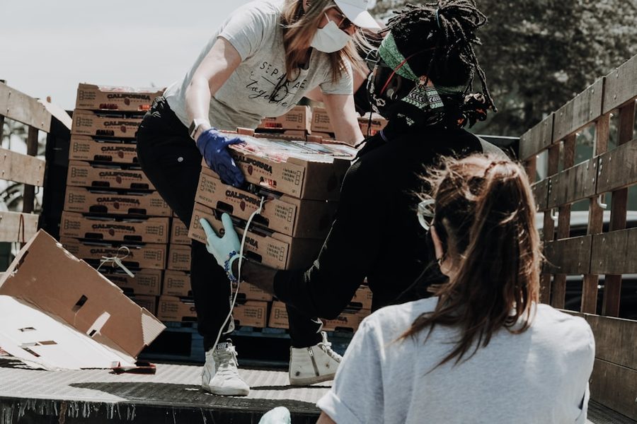 Volunteers sharing food at a Valor Village community drive